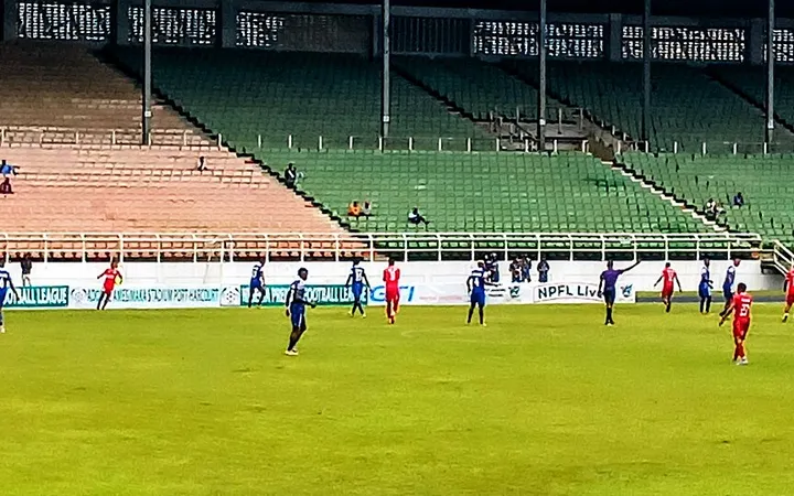 Football match under floodlights in Port Harcourt