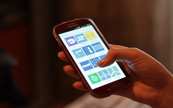Hands holding a smartphone