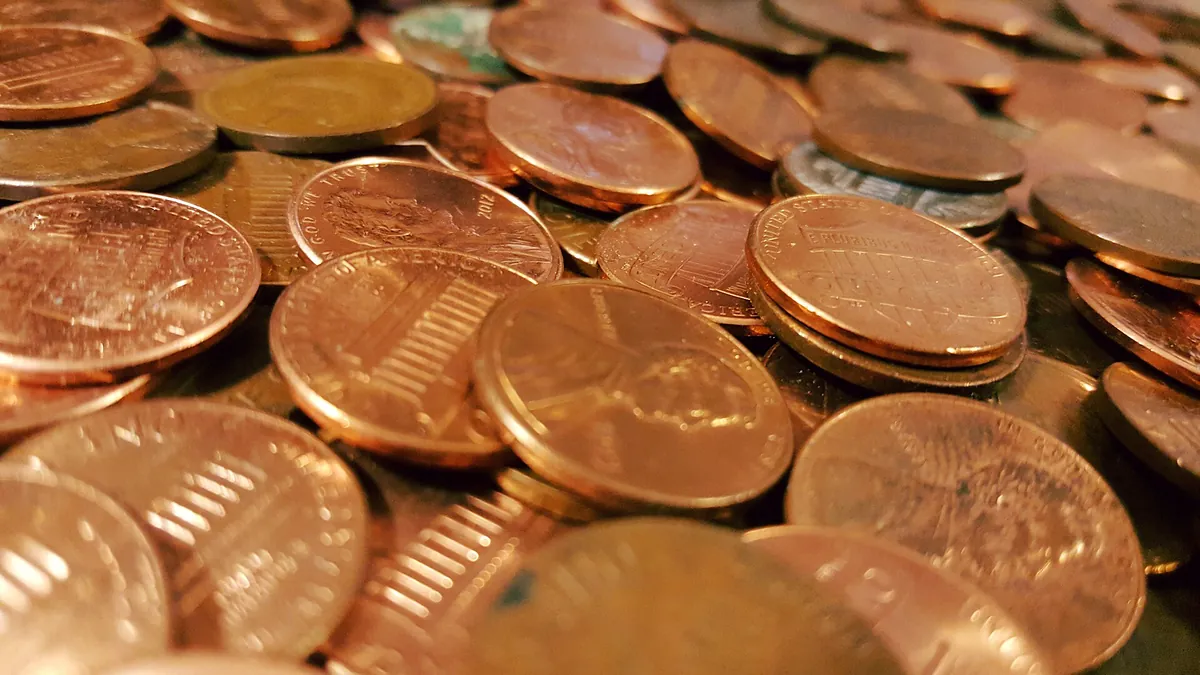 Close-up of a pile of small copper coins